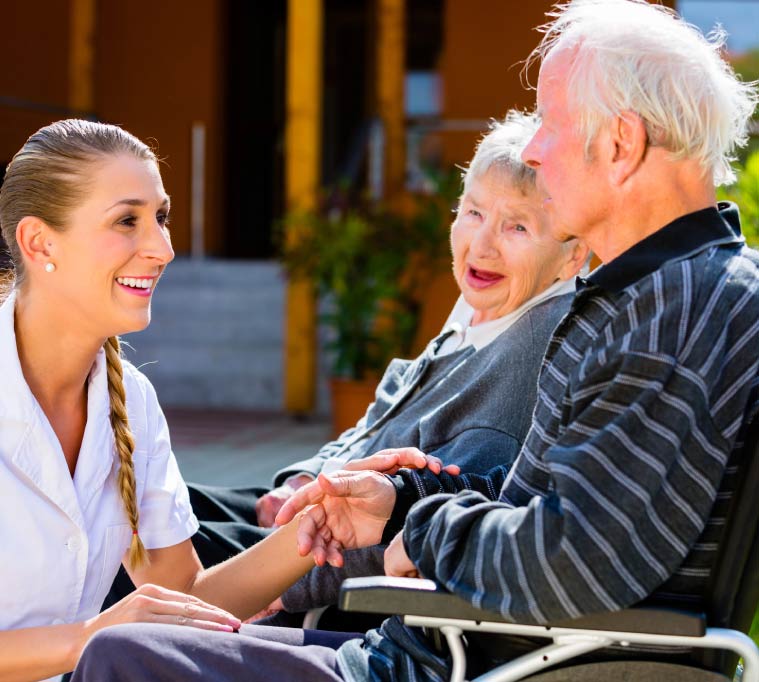 Senior enjoying a conversation with a companion caregiver at home in tulare ca